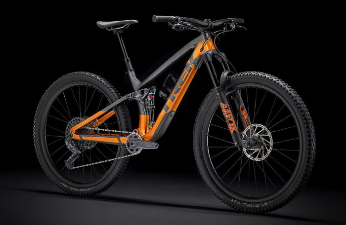 Trek Fuel EX 9.8 GX (Lithium Grey-Factory Orange) black background